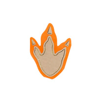 Isolated dinosaur footprint beverage napkin on white.