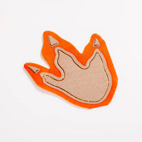 Single dinosaur footprint shaped napkin on white background.