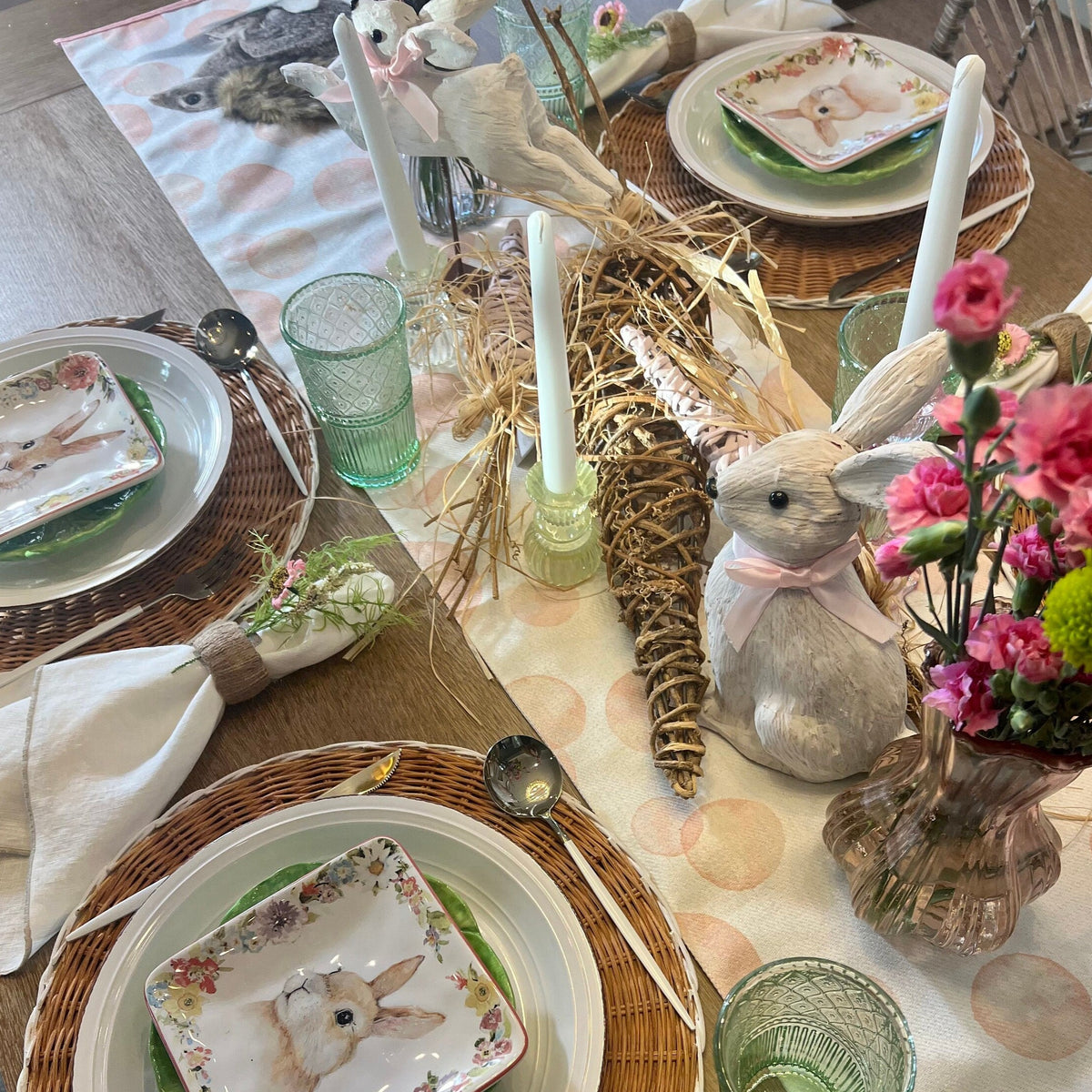 Easter table runner featuring pink polka dots and Easter Bunny design. Shown on an Easter Tablescape.