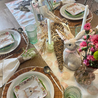 Easter table runner featuring pink polka dots and Easter Bunny design. Shown on an Easter Tablescape.