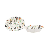 Two Halloween paper bowls, one upright and one angled to show interior and side profile of the festive pattern.