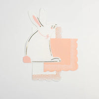 Set of bunny-shaped napkins arranged neatly for serving at an Easter gathering.