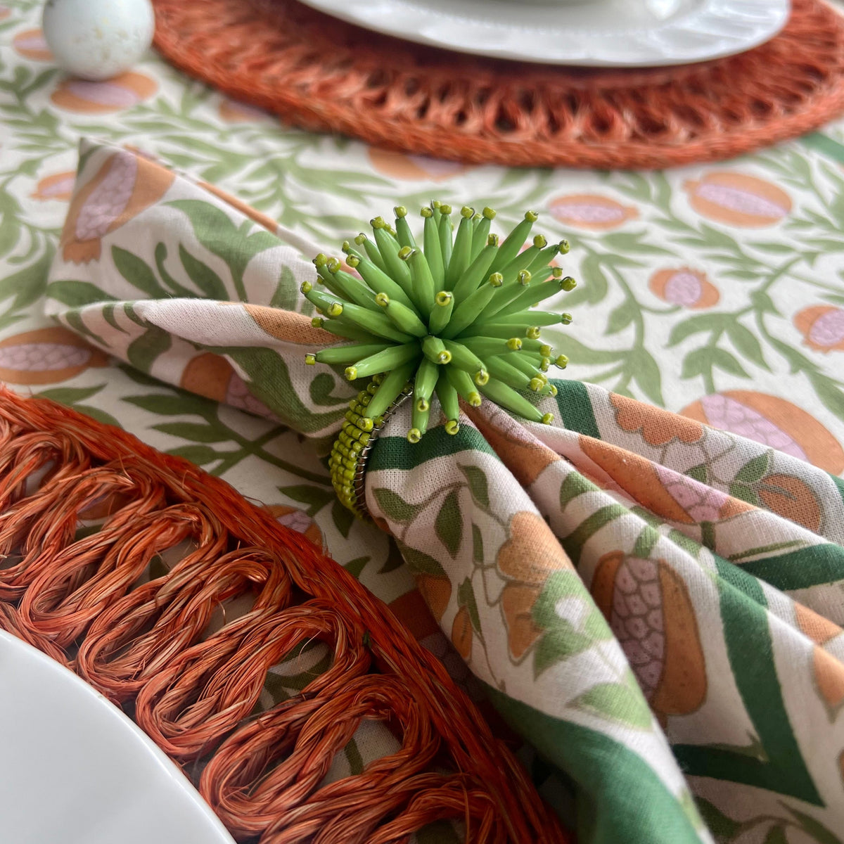 Green beaded napkin rings. 