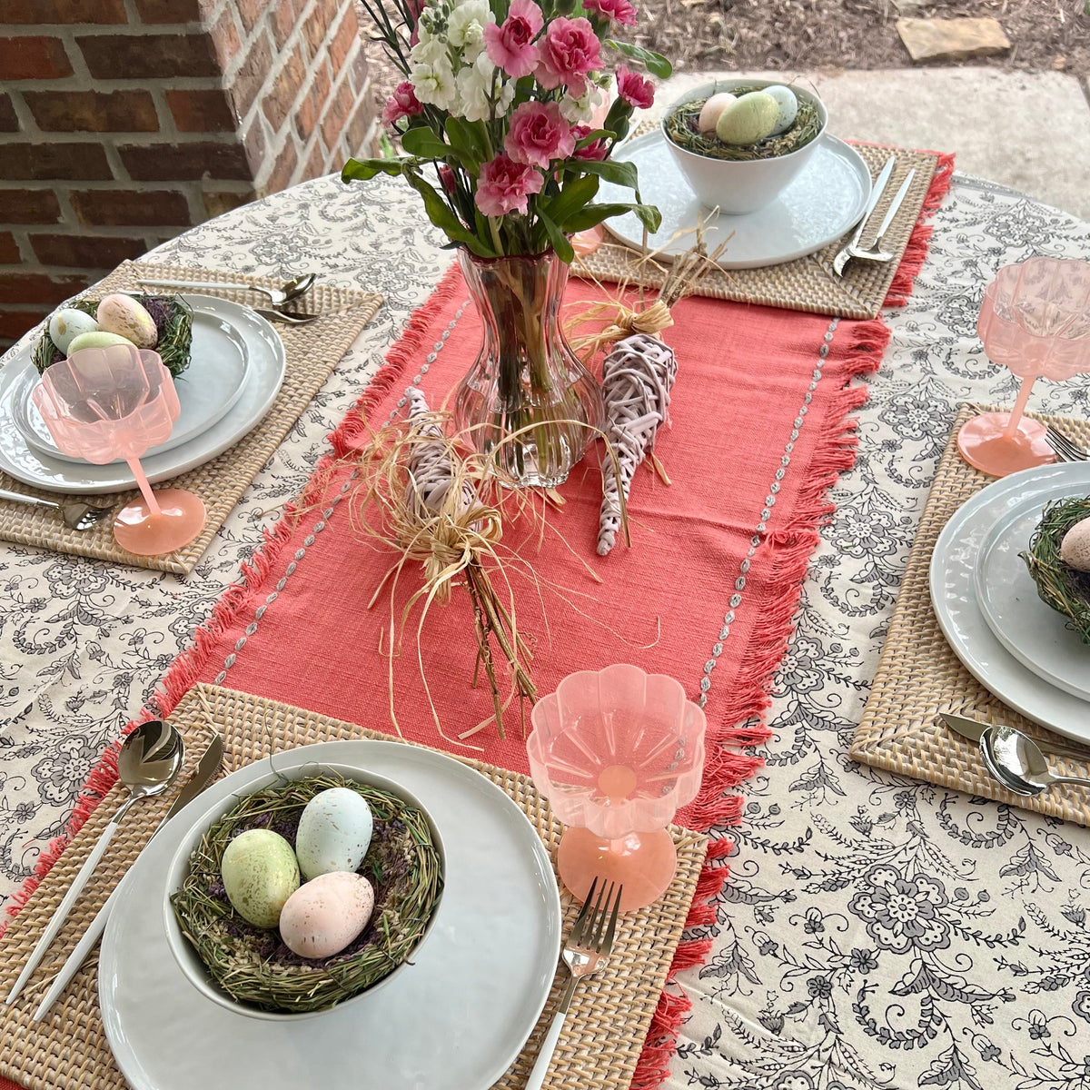 Pink table runner with fringe and stitching details - perfect for a Spring, Mother's Day or Easter table.