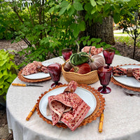 Revitalize your holiday dining with our eco-friendly Kalamkari Napkin Set. Crafted with traditional techniques, these terracotta napkins offer a striking addition to your Thanksgiving table, combining the artistry of block printing with the natural beauty of plant-based dyes.