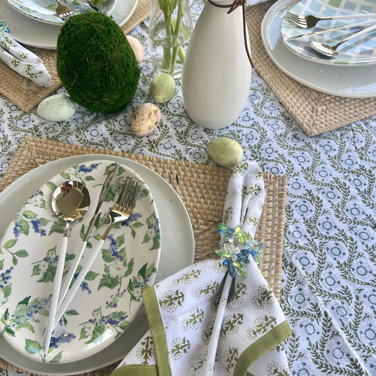 Easter plates shaped like oval eggs with different blue and green designs - perfect for Spring Table