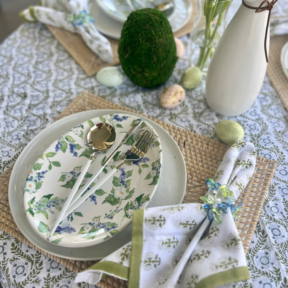 Easter plates shaped like oval eggs with different blue and green designs - perfect for Spring Table