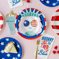 Hooray for the red white and blue paper dinner napkins.