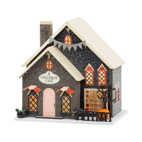 Cauldron Cafe light up Halloween village house in black glitter with pink door, black cat and cathedral windows