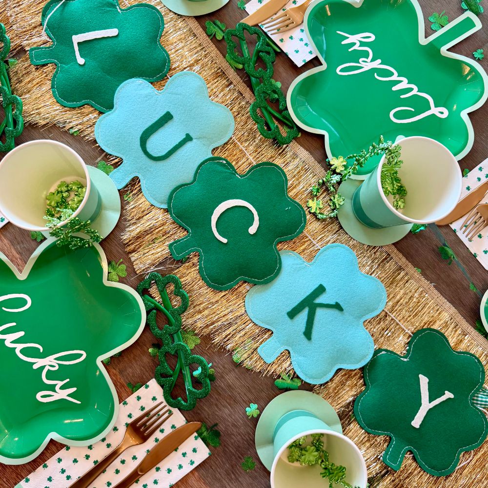 Lucky banner styled on St. Patrick's Day table with other coordinating tableware
