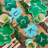 Lucky banner styled on St. Patrick's Day table with other coordinating tableware