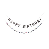 Playful Miles Per Hour Happy Birthday Banner Set decorating a car-themed birthday celebration for a young boy.