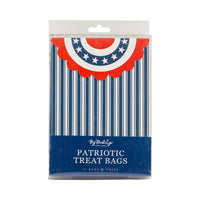 Stylish Americana goodie bag with classic blue stripes and baker’s twine closure, great for filling with holiday treats.
