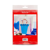 Pink and blue ice cream cone-shaped treat bag decorated with sprinkles and tied with red and white twine.