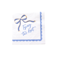 Napkin with blue bow design and 'Tying the Knot' text on a white background