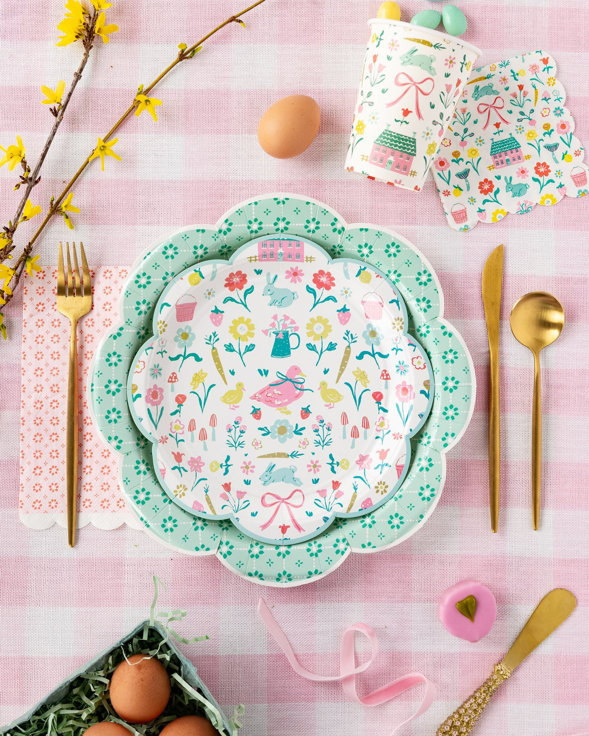 Vintage-style wicker plates displayed on a pastel tablecloth with matching spring decorations.