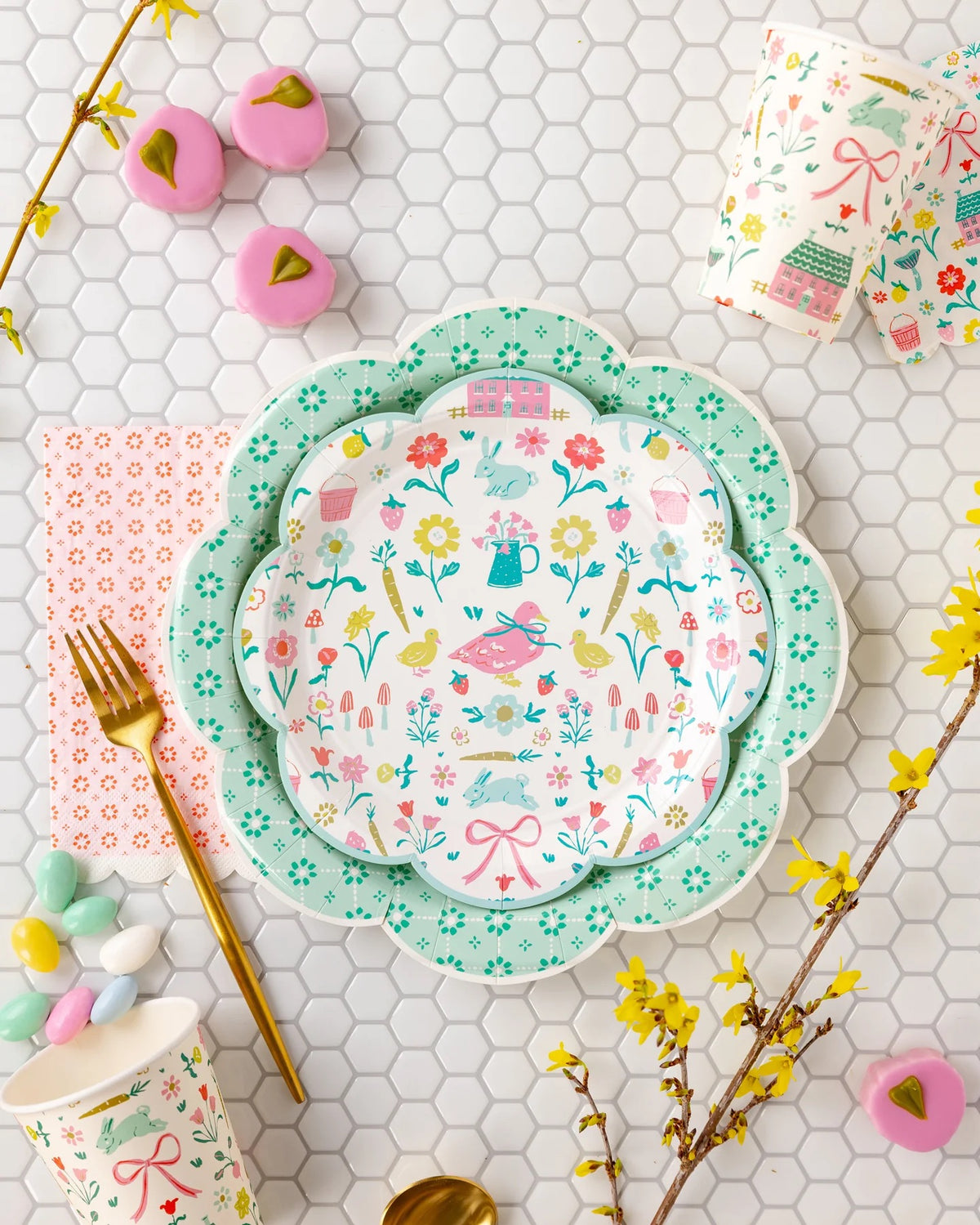 Green Wicker Plates styled with elegant floral tableware and vintage-inspired glassware at a garden party.