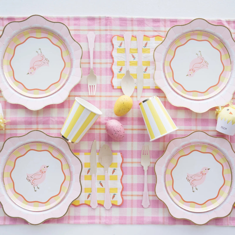 A beautifully styled Easter table featuring Sweet Carrot Easter napkins paired with matching pastel tableware, fresh florals, and festive decorations for a charming seasonal setup.