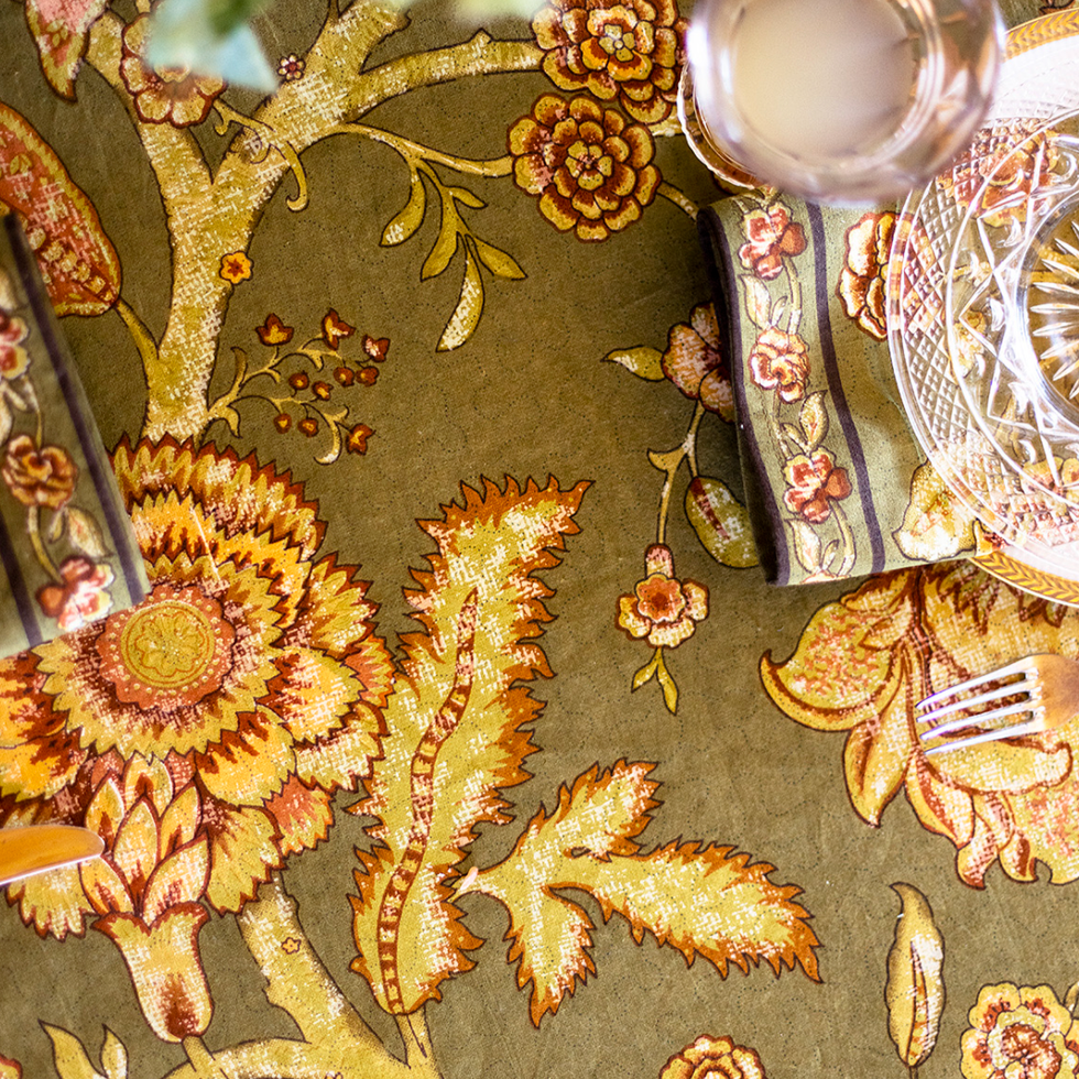 Transform your Thanksgiving table with our Sage Green Foliage Tablecloth. Perfect for both intimate and larger gatherings, available in 60" x 90" for six seats or 60" x 108" for eight. This 100% cotton Thanksgiving tablecloth beautifully complements your fall table decor with its rustic floral patterns, adding a classic autumn vibes to any meal.