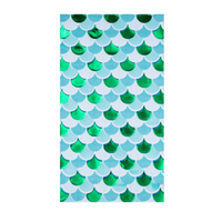 Close-up of one folded Shell Yeah Guest Napkin showing the shimmering green mermaid scale design.