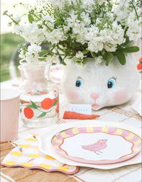 An Easter table setting featuring Sweet Carrot Easter napkins with a classic gingham design and playful carrot accents—perfect for brunch, baby showers, and spring parties.