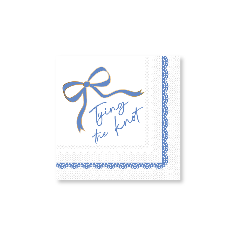 Paper napkin with blue bow and 'Tying the Knot' text on a white background