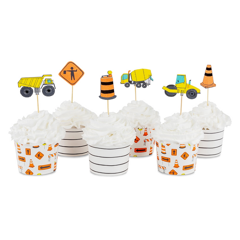 Set of six cupcakes with various construction-themed toppers and printed baking cups.