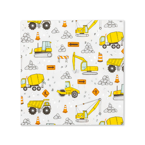 Single unfolded Under Construction large napkin featuring yellow construction trucks, caution signs, cones, and foil-pressed stone details.