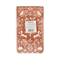 Back packaging view of the 24-pack Acorn Grove paper dinner napkins displaying the product barcode and manufacturer details.