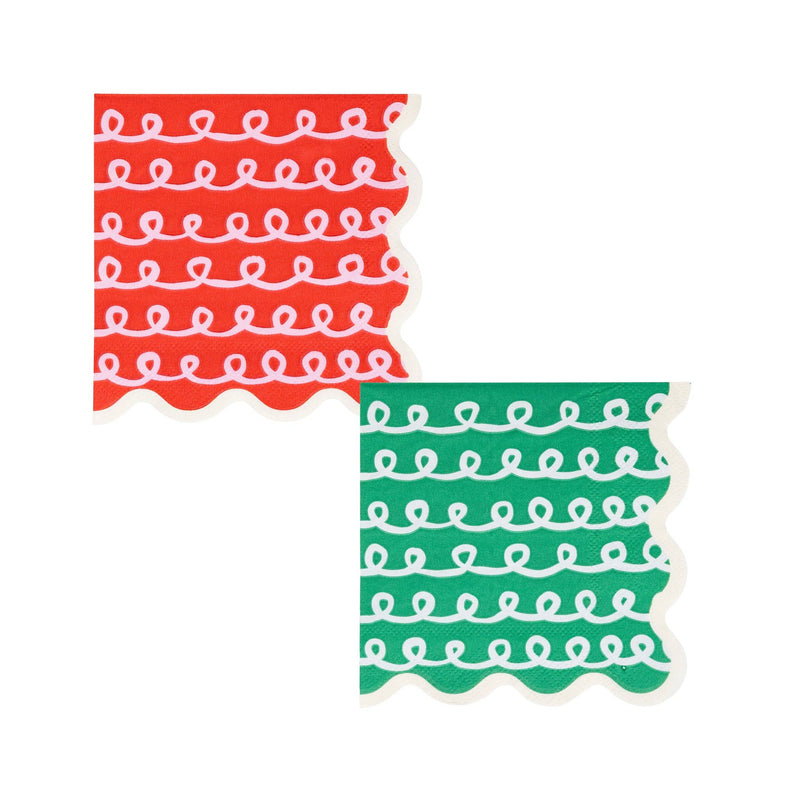 Flat lay of both Frosting Cocktail Napkin designs—one red, one green—with matching scalloped edges.