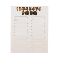 Gold foil sticker sheet with numbers 1 through 12 and to/from gift labels