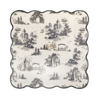 Stack of cream-and-black toile dinner plates in a clear packaging, front view. 
