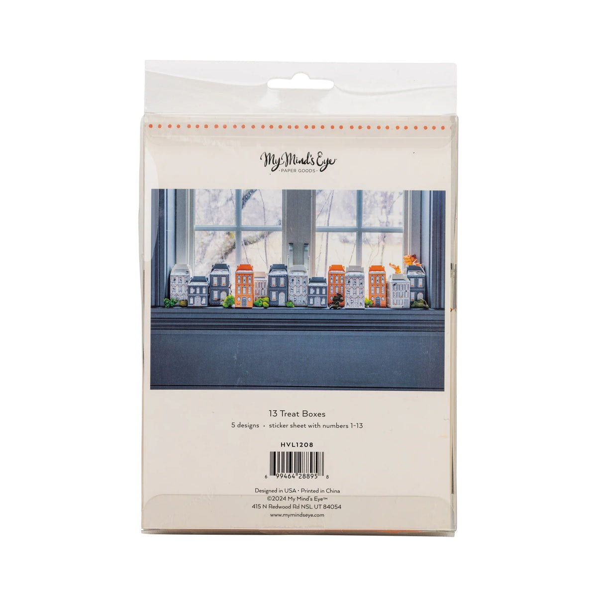 Back of package showing a full windowsill display of the assembled haunted house treat boxes and callout for numbered stickers 1–13 for a Halloween countdown.