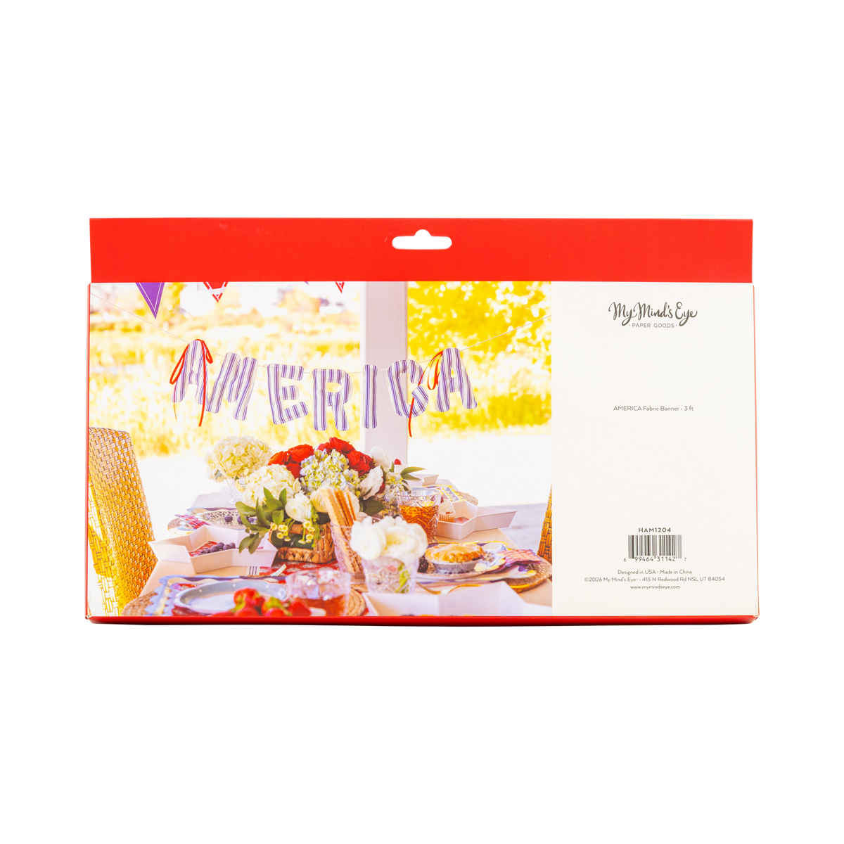 Back of red packaging box for America fabric banner showing styled 4th of July tablescape