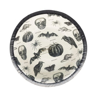 Round bowl with Halloween-themed design featuring skulls, pumpkins, and bats on a white background.