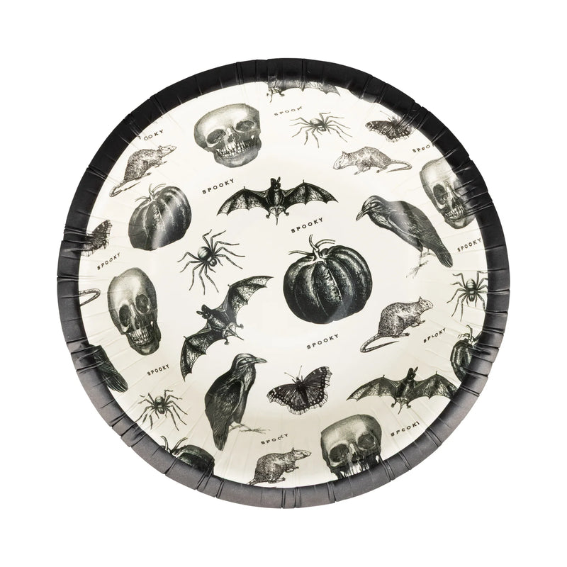 Halloween-themed paper bowl with black and white illustrations of skulls, bats, pumpkins, and rats on a white background.