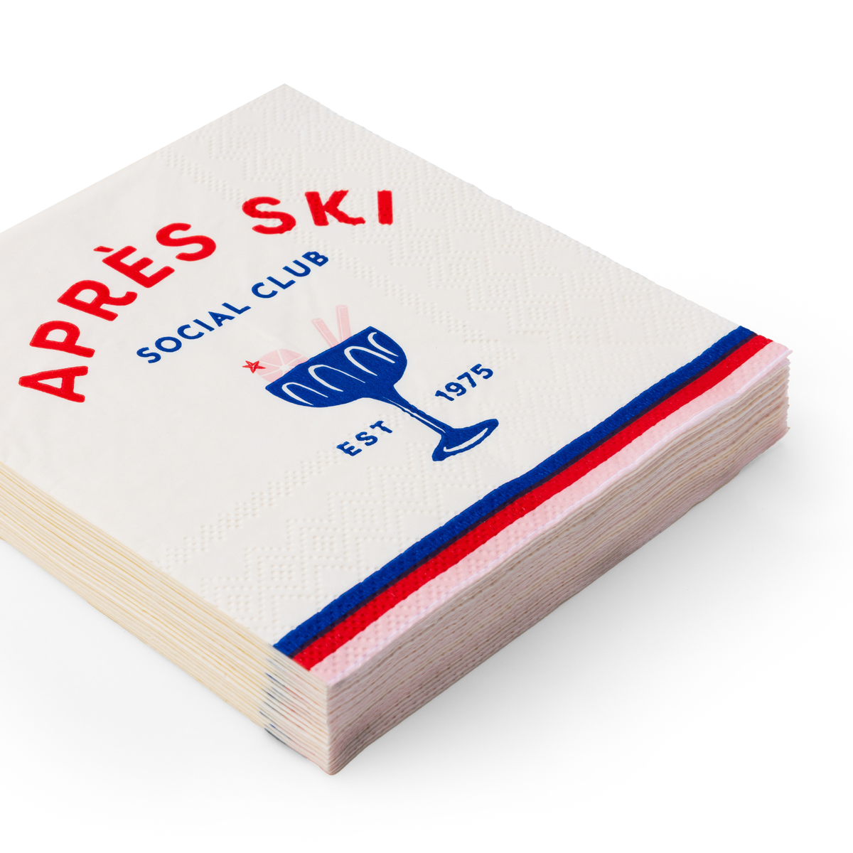 Stack of Après Ski cocktail napkins with red and blue border