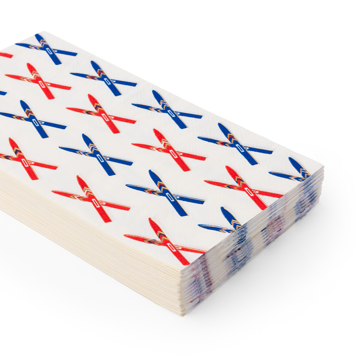 Stack of Après Ski guest towels featuring red and blue ski motifs