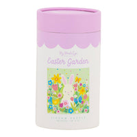 Front view of the My Mind's Eye Easter Garden Jigsaw Puzzle storage tube featuring a colorful bunny and flower illustration.