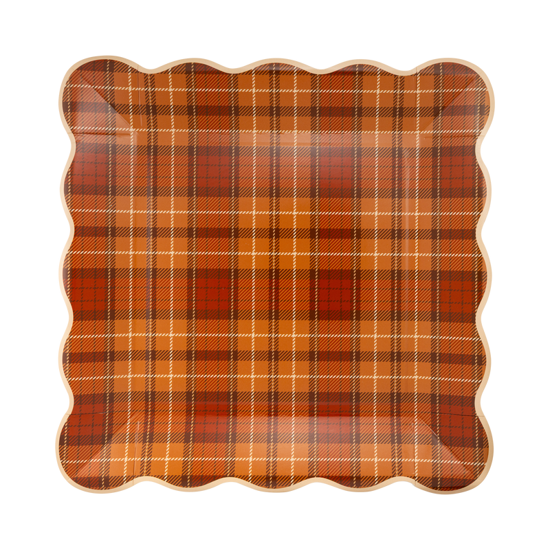 Brown, orange, and cream plaid square paper plate with a wavy edge, front view.