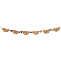 Orange spider web paper banner strung with die-cut webs and small black bow ties between each one