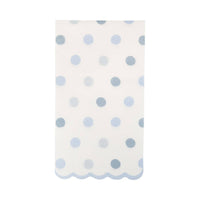 Baby blue polka dot dinner napkin with scalloped edge on white background