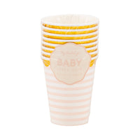 Packaged baby pink party cups with gold foil details visible