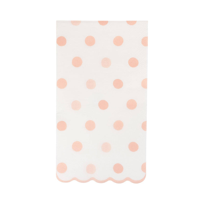 Baby pink polka dot dinner napkin with scalloped edge on white background