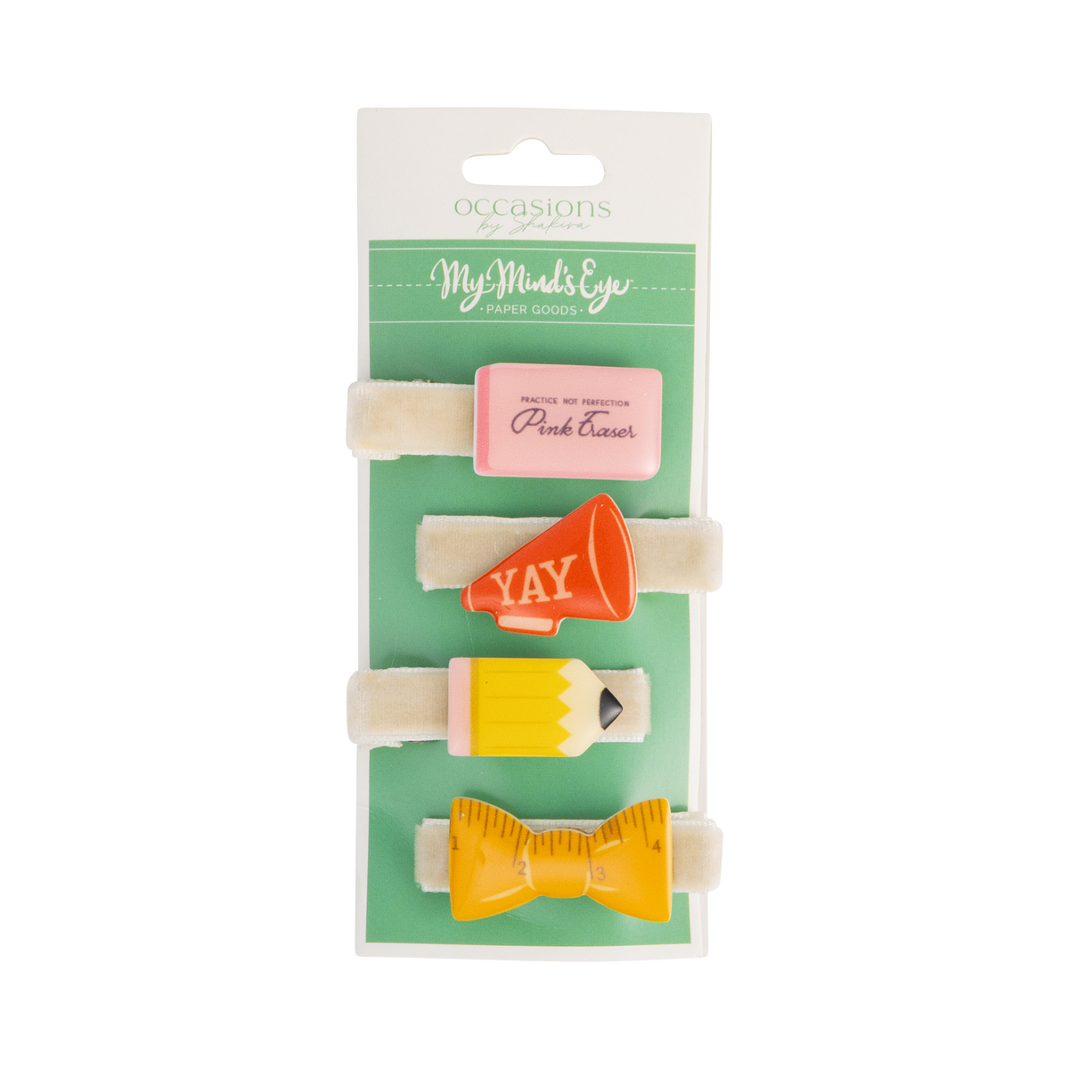 Front view of back to school hair barrette set packaging with four designs — pink eraser, red megaphone, yellow pencil, and yellow ruler bow — displayed on cream velvet alligator clips
