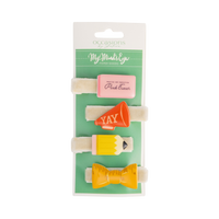 Front view of back to school hair barrette set packaging with four designs — pink eraser, red megaphone, yellow pencil, and yellow ruler bow — displayed on cream velvet alligator clips