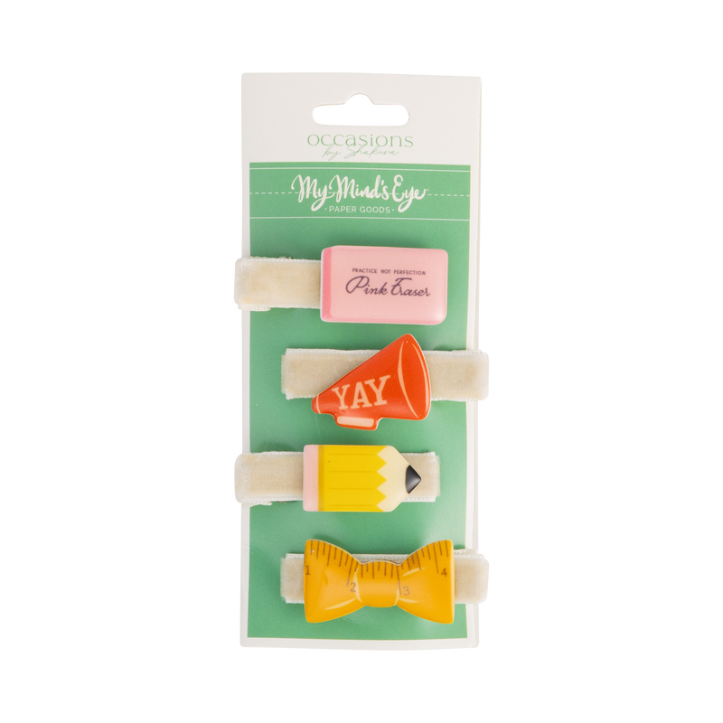 Front view of back to school hair barrette set packaging with four designs — pink eraser, red megaphone, yellow pencil, and yellow ruler bow — displayed on cream velvet alligator clips