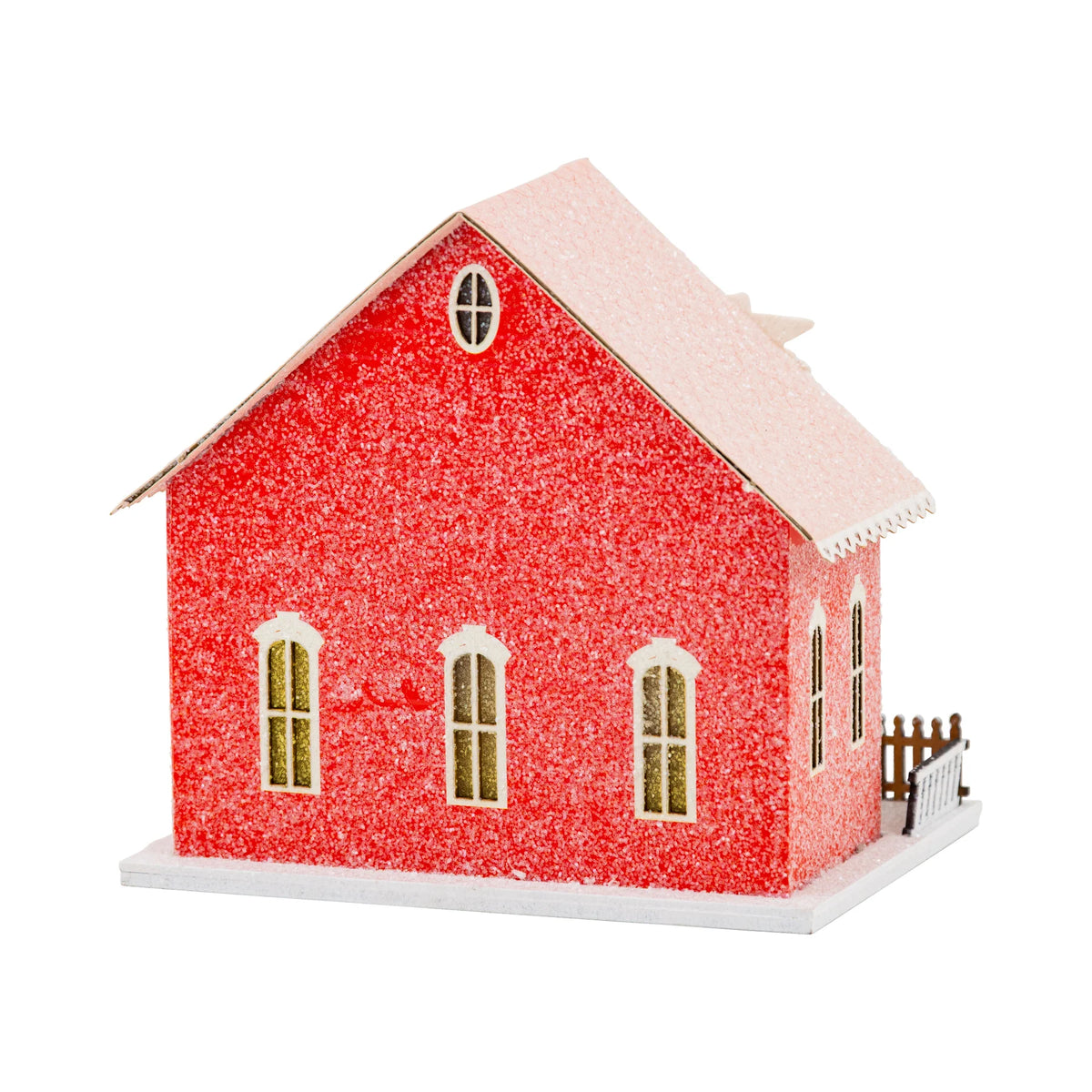 Back view of the valentine gingerbread house showing the red glitter texture and pink roof.