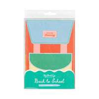 Packaged set of backpack-shaped treat bags with branding.