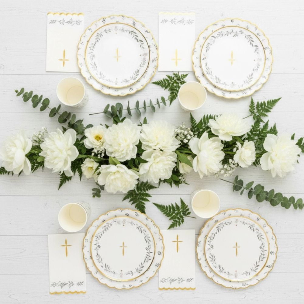 baptism table setup with floral greenery napkins